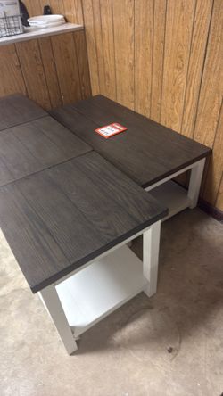 Three-piece cocktail table set two end tables and one cocktail table for $500 brand new