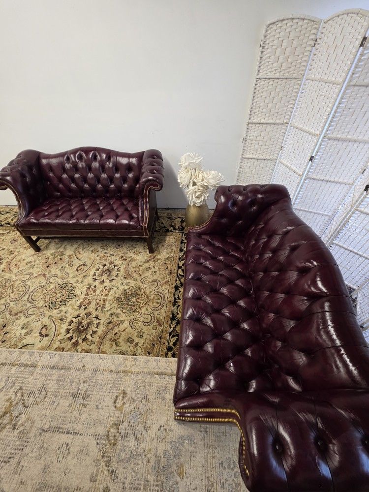 Vintage Tufted Leather Chippendale Style Sofa in Burgundy
Free Local Delivery!