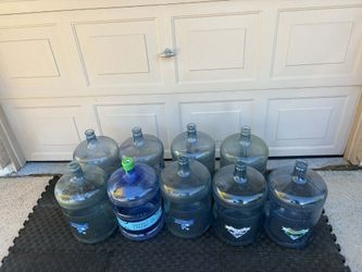 5-gallon reusable water jugs / 9 Bottles