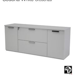 Sedona White credenza in perfects conditions.Includes a custom-cut glass top for added protection and to keep the surface in excellent condition.”