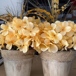 2 Flower Pots With Faux Flowers For $10