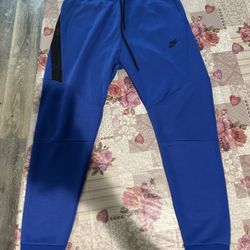 Blue Nike Tech Pants 