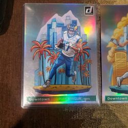 2 Big Downtowns Puka  Nacua, Sam LaPorta. 1 Big Marshawn Lynch Card /49
