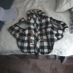 A Very Nice Dog Jacket That Has A Checkered Outside And A Wall Inside Very Nice And For Large Dogs