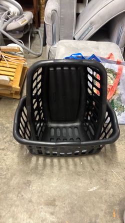2 black laundry baskets