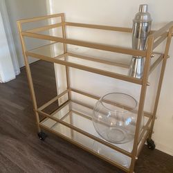 Gold bar cart with mirrors
