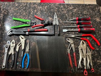 Pliers, Wire Splitters, Picks.