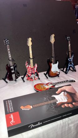 Mini Guitar (comes With Stand)