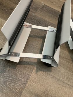 Metal brackets w/wheels for moving large items