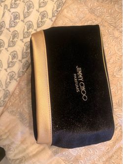 Jimmy Choo travelers bag