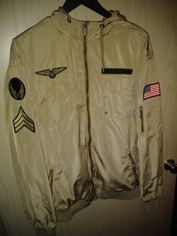 Mens large jacket with hood. Brand new. Never worn. 70.00$paid 140 for it at champs.