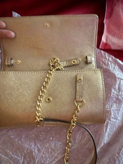 Bolso. Mk. Color oro