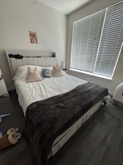 Queen-sized bedframe with charging headboard
