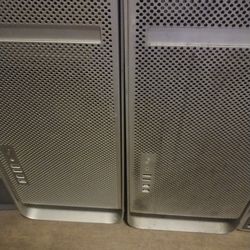Lot of threeclassic Apple Mac Pro “cheesegrater” towers.
