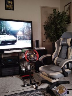 Xbox one  S  with all the cables ,3 games one controller and headset has rechargeable   battery pack and  Ferrari racing wheel and adjustable stand