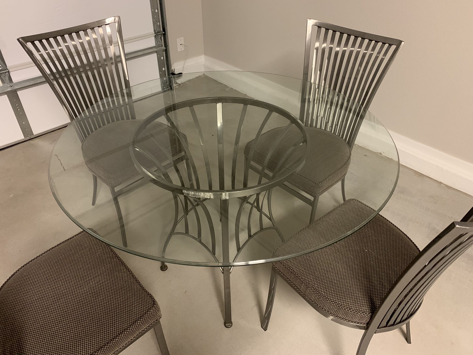 Glass dining table and 4 chairs Like New