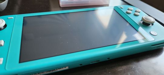 Nintendo Switch Lite W/ 3 Games