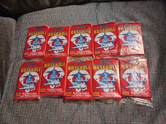 Ten 38 year old unopened packs sports cards.