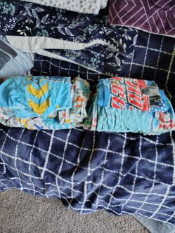 Two kids twin sized sheet sets with matching pillow cases