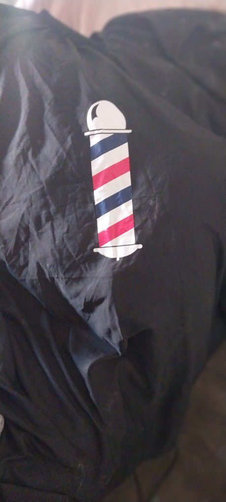Barber Smock For Hair Cuts And Transformation Black One Size Fits All And Has Original Barber Spindle Logo On Front Side 