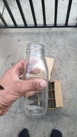 Glass Milk Bottles They don't have a lid.