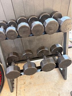 5 pairs of cap rubber coated dumbbells with rack all in good condition pick up in sun valley cash only