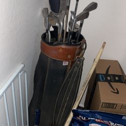 Set of vintage golf clubs