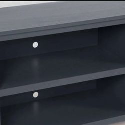 $100. Living Spaces TV Stand