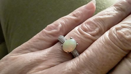 Beautiful Welo Opal Ring with White Zircon accents.