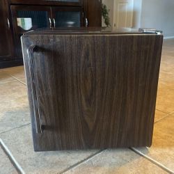 Brown mini fridge 