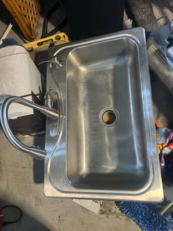 Sainless steel kitchen sink with soap dispenser and faucet $100 firm