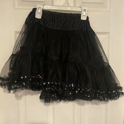 Black TuTu skirt with silver sequins on bottom, good for under another skirt Middle part is see through 