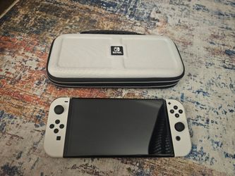 Nintendo Switch OLED with all accessories and case