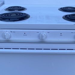 USED 4 BURNER RANGE