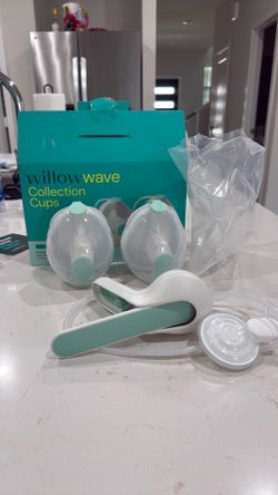 Used willow wave double manual breast pump