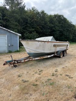 Classic boat and tandem axle trailer must be picked up by noon 8/29/26