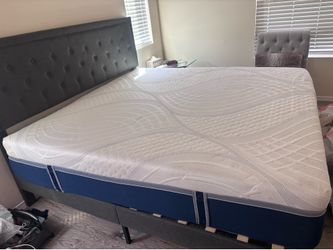 King bed with  gray headboard and frame