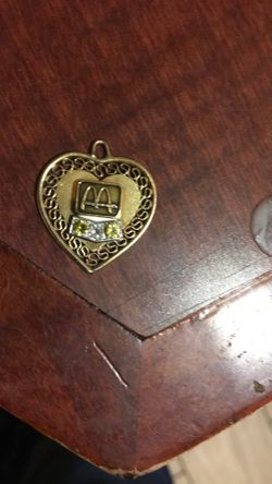 Mc Donald’s 14k gold and diamond pendant