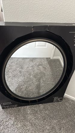 Brand new oval black mirror