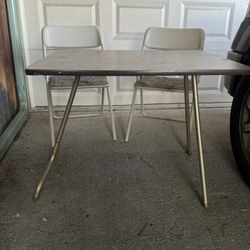 Folding Table And 2 Folding Chairs. 