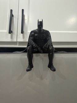 Sitting Batman figure