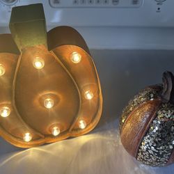 Lighted Pumpkin And Decorative Pumpkin