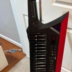 Roland AX- Edge Keytar 49 key synthesizer New open box play 3 time in home Best offer