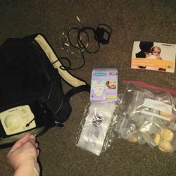 Medela Portable Breast Pump, Diaper Bag, Charger, Booklet, Attachments, Bottles And Milk Storage Bags 