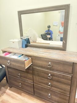 The dresser is in excellent condition.