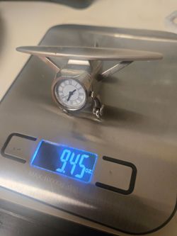 Beautiful Stainless Stel airplane clock.