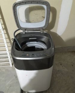 Portable compact washer
