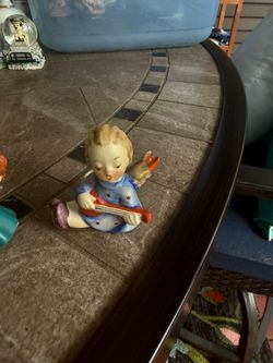Hummel-Style Ceramic Child Figurine with Bird