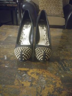 Black gold stud heels