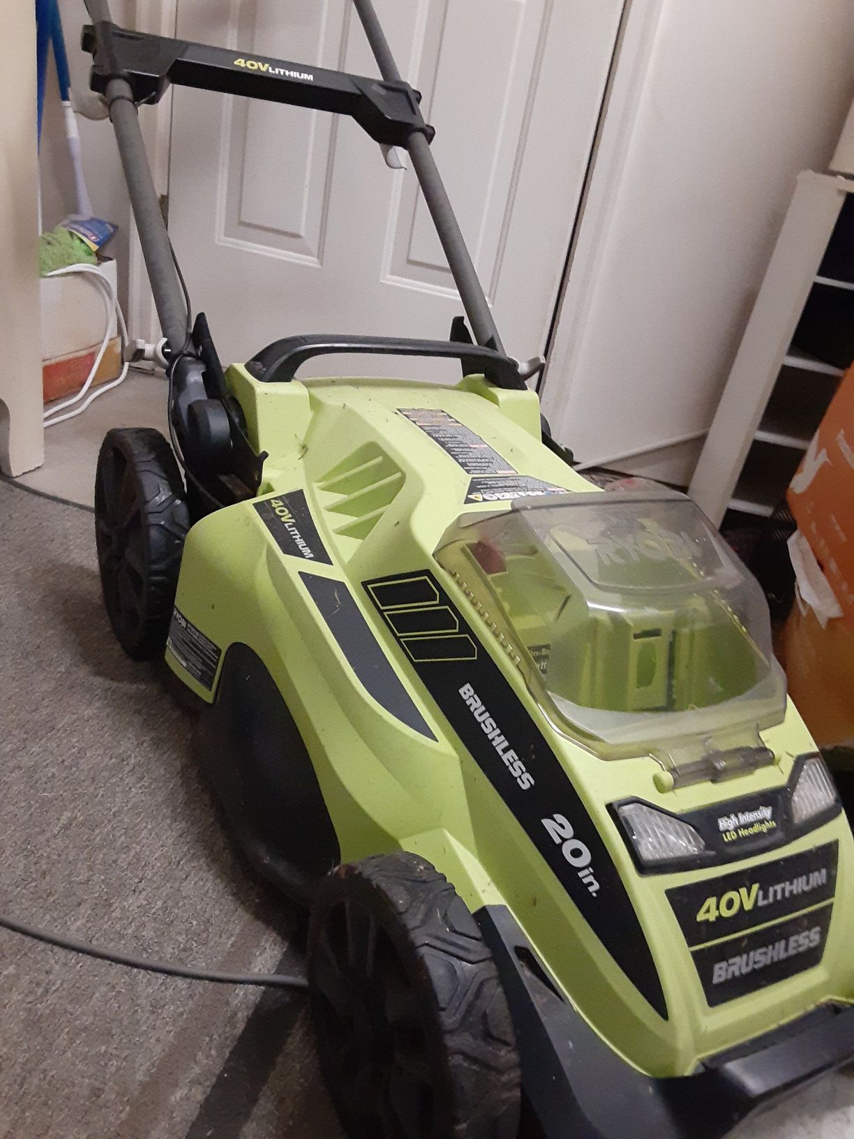 Ryobi 40v push mower with charger 20 inch cutting width.